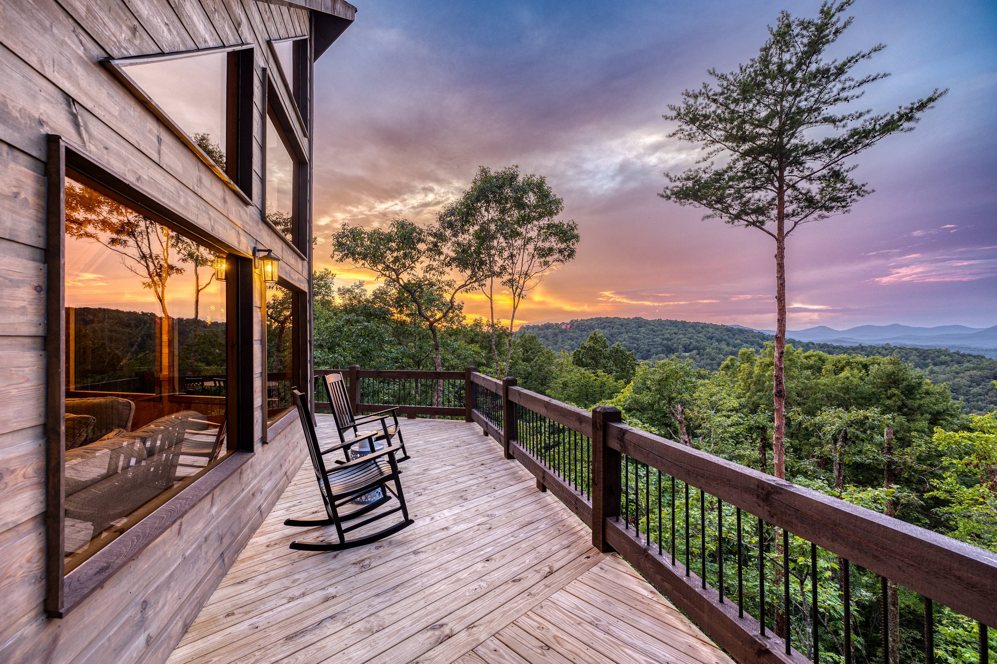 Mountain cabin deck at sunset
